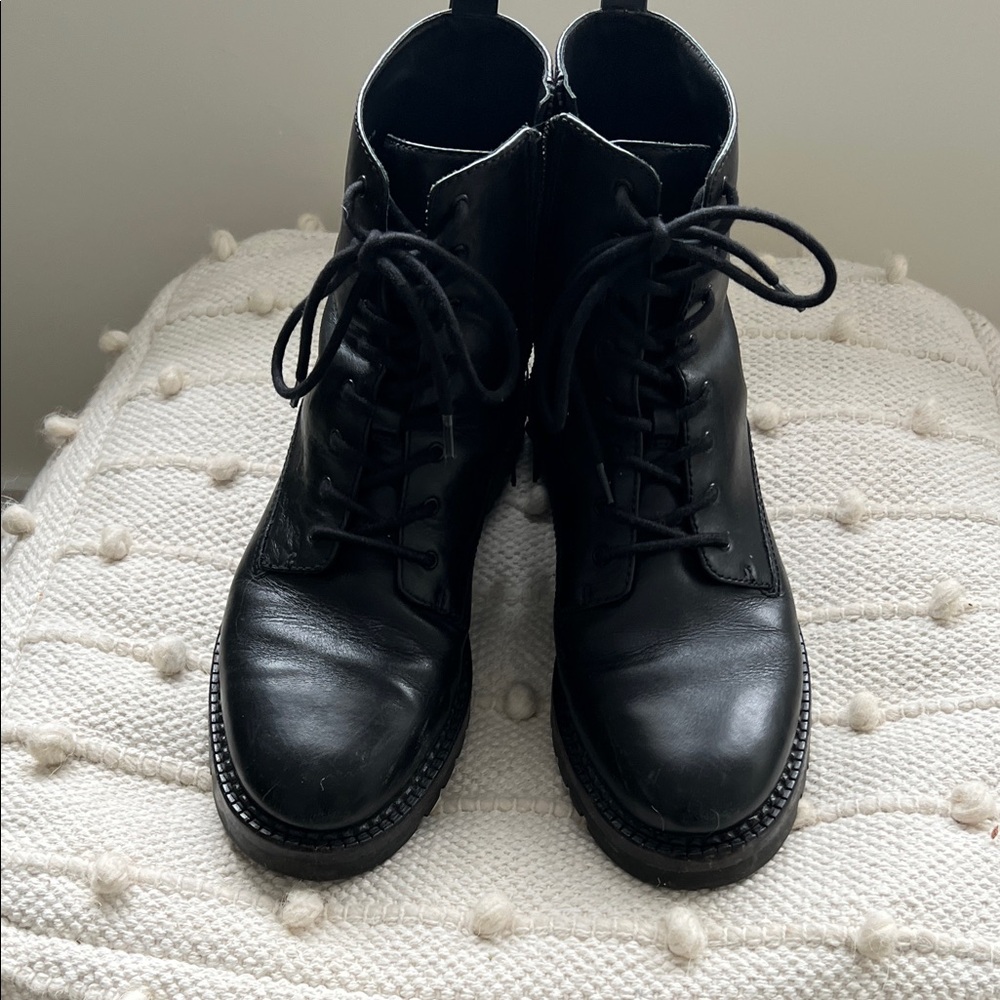 Vince combat style black leather boots with rugged sole and laces size 9.